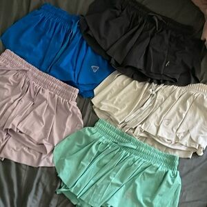 amazon butterfly shorts in blue, purple, teal, white, and gray